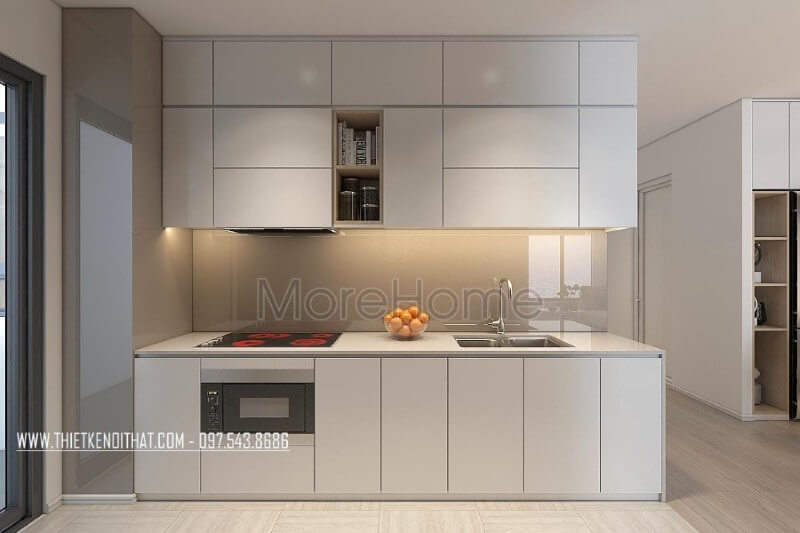 Mẫu tủ bếp kiểu dáng chữ i gỗ acrylic màu trắng kết hợp phân chia các ngăn tủ một cách hợp lí, tạo cho người nội trợ thuận tiện hơn trong quá trình mang lại những bữa cơm ngon miệng cho những người thân yêu của mình Thiết kế và sản xuất tủ bếp đẹp