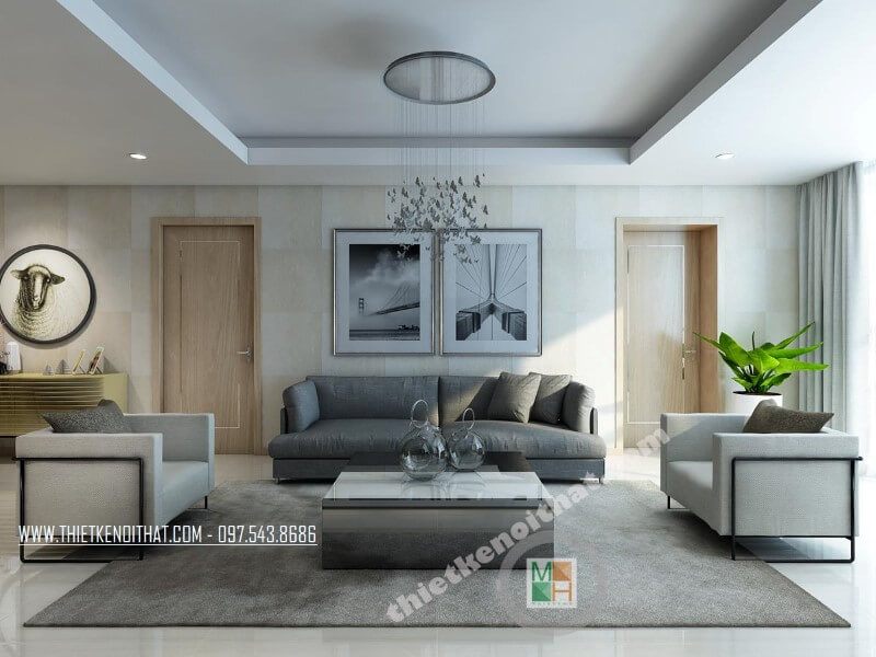 Mẫu thiết kế phòng khách chung cư hiện đại với bộ sofa bọc vài màu xám và trắng tạo điểm nhấn nổi bật cho căn phòng.
