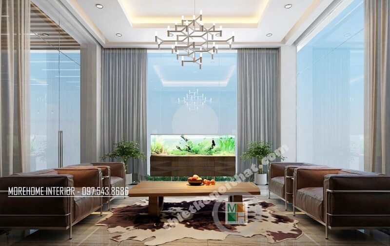 Mẫu thiết kế phòng tiếp khách tại sảnh lớn công ty VCC sang trọng, đẳng cấp với đồ nội thất cao cấp như: sofa da nhập khẩu, bàn gỗ tự nhiên, đèn trang trí,..